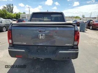 2017 Honda Ridgeline RTL-E with VIN 5FPYK3F74HB027130, listed as a Copart auction lot 60146905 with 99,964 mi miles and Salvage title. Bid and sale history available at DreamBid. Image 6.