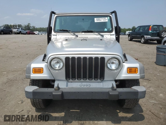 2005 Jeep Wrangler Sport с VIN 1J4FA49SX5P317067, выставлен на аукционе Copart как лот 60627125 с пробегом 170 700 миль миль и Чистый • Clean title. История ставок и продаж доступна на DreamBid. Изображение 5.