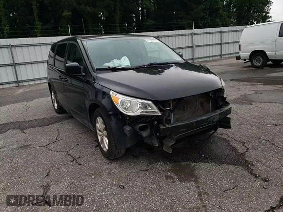 2014 Volkswagen Routan SE z VIN 2C4RVABG1ER134621, wystawiony jako Copart lot #61339414 z przebiegiem 153 364 mil mil oraz Szkoda całkowita • Salvage title. Historia ofert i sprzedaży dostępna na DreamBid. Obrazek 11.