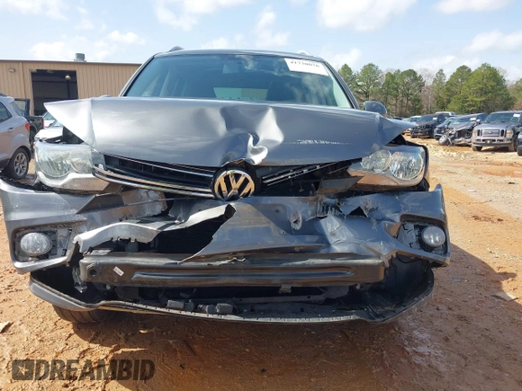 2015 Volkswagen Tiguan SE z VIN WVGBV7AXXFW503955, wystawiony jako IAAI lot #41730076 z przebiegiem 146 446 mil mil oraz . Historia ofert i sprzedaży dostępna na DreamBid. Obrazek 13.