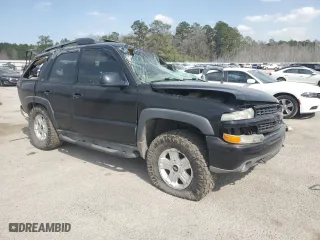 2003 Chevrolet Tahoe LT with VIN 1GNEK13Z73R243537, listed as a Copart auction lot 47000435 with 0 mi miles and Salvage Title. Bid and sale history available at carsss.com. Image 4.