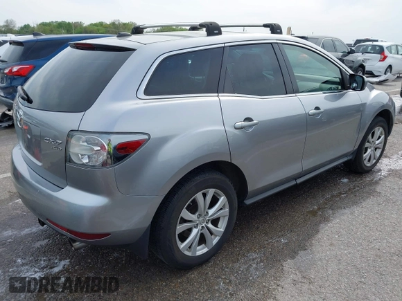 2011 Mazda CX-7 S Touring z VIN JM3ER4C30B0393887, wystawiony jako IAAI lot #42093166 z przebiegiem 123 920 mil mil oraz . Historia ofert i sprzedaży dostępna na DreamBid. Obrazek 4.