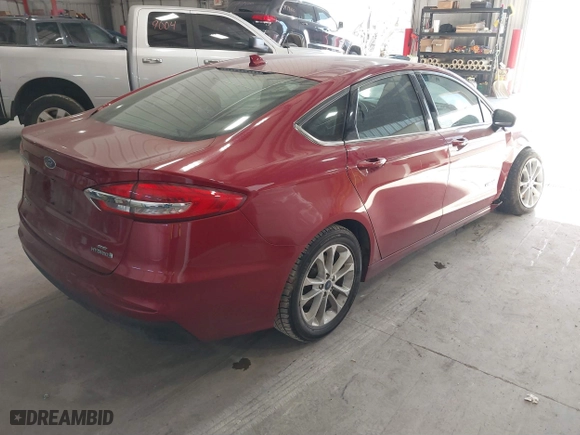 2019 Ford Fusion Hybrid SE with VIN 3FA6P0LUXKR205712, listed as a IAAI auction lot 41267049 with 124,687 mi miles. Bid and sale history available at carsss.com. Image 4.