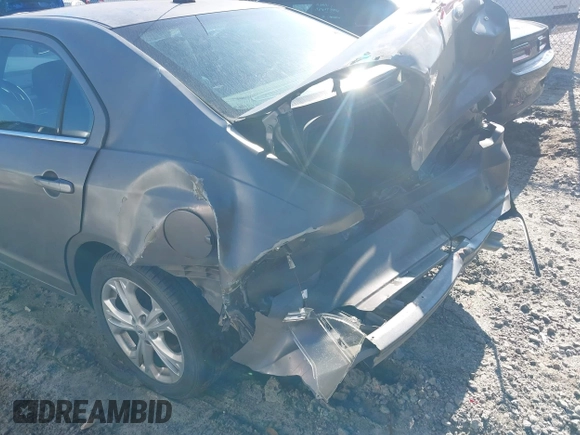 2012 Ford Fusion SE with VIN 3FAHP0HA9CR428400, listed as a IAAI auction lot 42556569 with 205,285 mi miles and . Bid and sale history available at DreamBid. Image 6.