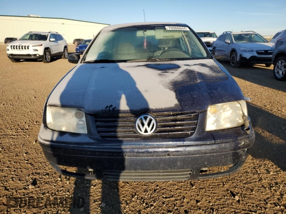 2000 Volkswagen Jetta GLS z VIN 3VWSA29M7YM057356, wystawiony jako Copart lot #76960844 z przebiegiem 299 410 mil mil oraz Szkoda całkowita • Salvage title. Historia ofert i sprzedaży dostępna na DreamBid. Obrazek 5.