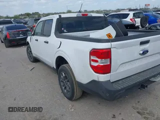 2023 Ford Maverick XL with VIN 3FTTW8E96PRA74020, listed as a IAAI auction lot 41782011 with 30,592 mi miles and . Bid and sale history available at DreamBid. Image 3.