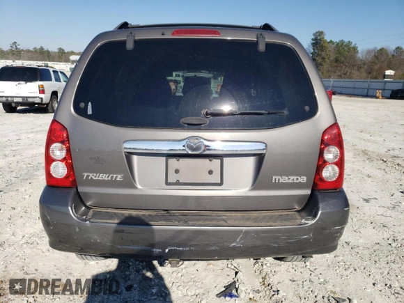 2006 Mazda Tribute S with VIN 4F2YZ04176KM19634, listed as a Copart auction lot 46796315 with 276,632 mi miles and Salvage Title. Bid and sale history available at DreamBid. Image 6.