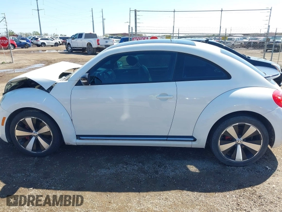 2012 Volkswagen Beetle with VIN 3VWV87AT1CM627756, listed as a IAAI auction lot 41657307 with 81,924 mi miles and . Bid and sale history available at DreamBid. Image 14.