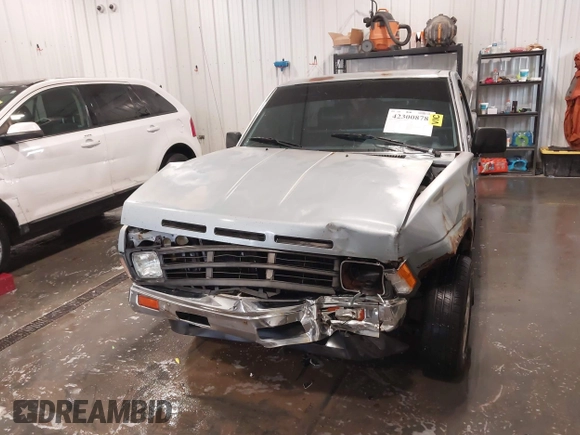 1990 Nissan Frontier with VIN 1N6SD11S7LC401368, listed as a IAAI auction lot 42300878 with 169,592 mi miles and . Bid and sale history available at DreamBid. Image 6.