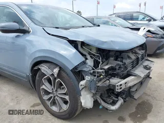 2020 Honda CR-V EX with VIN 7FARW1H58LE003895, listed as a IAAI auction lot 41841608 with 56,757 mi miles and . Bid and sale history available at carsss.com. Image 19.
