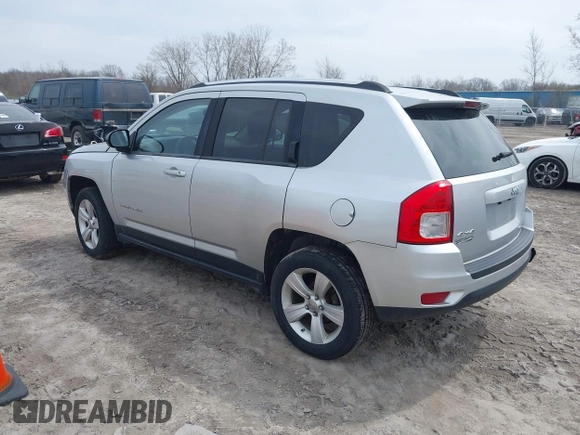 2012 Jeep Compass Sport with VIN 1C4NJDBB4CD624163, listed as a IAAI auction lot 42025783 with 148,928 mi miles. Bid and sale history available at carsss.com. Image 3.