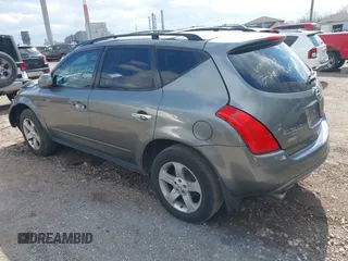2005 Nissan Murano SE with VIN JN8AZ08T05W301823, listed as a IAAI auction lot 41956085 with 138,811 mi miles and . Bid and sale history available at DreamBid. Image 3.