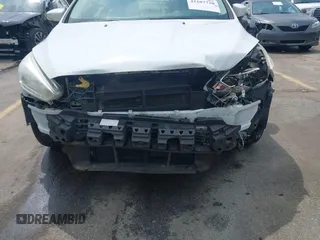 2015 Ford Focus SE with VIN 1FADP3F28FL204145, listed as a IAAI auction lot 42107720 with 129,441 mi miles and . Bid and sale history available at DreamBid. Image 6.