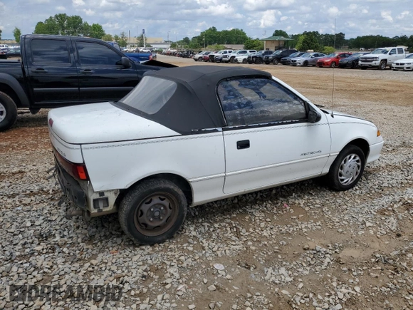 1993 Geo Metro z VIN JG1MR3362PK209644, wystawiony jako Copart lot #58749655 z przebiegiem 149 163 mil mil oraz Szkoda całkowita • Salvage title. Historia ofert i sprzedaży dostępna na DreamBid. Obrazek 3.