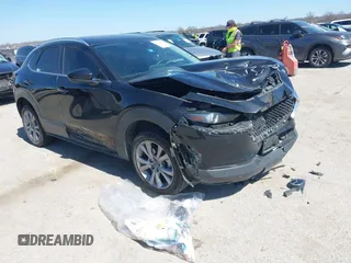 2022 Mazda CX-30 S Select z VIN 3MVDMBBL7NM413447, wystawiony jako IAAI lot #41772804 z przebiegiem 69 102 mil mil oraz . Historia ofert i sprzedaży dostępna na DreamBid. Obrazek 1.