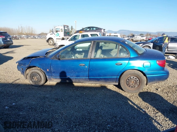 2002 Saturn SL z VIN 1G8ZF52802Z134506, wystawiony jako IAAI lot #41461865 z przebiegiem 210 886 mil mil oraz . Historia ofert i sprzedaży dostępna na DreamBid. Obrazek 14.