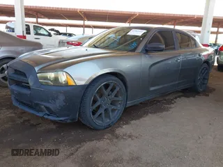 2012 Dodge Charger SE with VIN 2C3CDXBG4CH168491, listed as a IAAI auction lot 41982492 with 191,698 mi miles and . Bid and sale history available at DreamBid. Image 2.