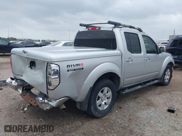2005 Nissan Frontier LE with VIN 1N6AD07U25C457977, listed as a IAAI auction lot 41906592 with 256,116 mi miles and . Bid and sale history available at DreamBid. Image 4.