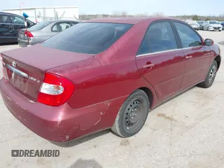 2004 Toyota Camry LE with VIN JTDBE32K840271548, listed as a IAAI auction lot 41835859 with 172,455 mi miles. Bid and sale history available at carsss.com. Image 4.