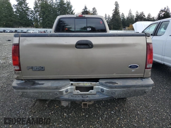 2003 Ford F-350 XL with VIN 1FTSW31F13EA13259, listed as a Copart auction lot 80345954 with 209,898 mi miles and Salvage title. Bid and sale history available at DreamBid. Image 6.