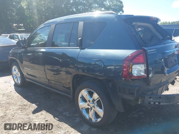 2015 Jeep Compass Latitude with VIN 1C4NJCEBXFD179373, listed as a IAAI auction lot 39380614 with 104,832 mi miles. Bid and sale history available at carsss.com. Image 3.