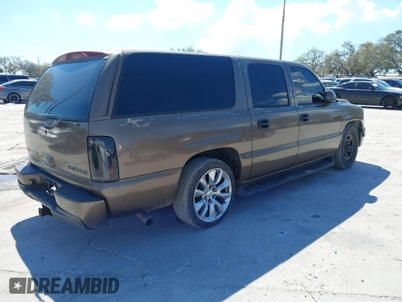 2004 Chevrolet Suburban LT z VIN 1GNEC16Z84J186242, wystawiony jako IAAI lot #41650162 z przebiegiem 268 767 mil mil oraz . Historia ofert i sprzedaży dostępna na DreamBid. Obrazek 4.