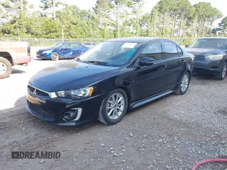 2016 Mitsubishi Lancer ES z VIN JA32U2FUXGU010572, wystawiony jako IAAI lot #42420691 z przebiegiem 71 602 mil mil oraz . Historia ofert i sprzedaży dostępna na DreamBid. Obrazek 2.