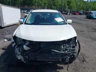 2017 Nissan Rogue S z VIN JN8AT2MV7HW014827, wystawiony jako IAAI lot #42533438 z przebiegiem 59 393 mil mil oraz . Historia ofert i sprzedaży dostępna na DreamBid. Obrazek 12.
