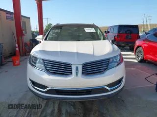 2017 Lincoln MKX Reserve with VIN 2LMPJ6LR6HBL52244, listed as a IAAI auction lot 41908684 with 77,886 mi miles. Bid and sale history available at carsss.com. Image 13.