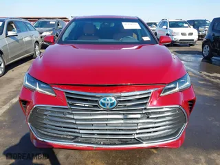 2019 Toyota Avalon Hybrid Limited with VIN 4T1B21FB8KU010221, listed as a IAAI auction lot 41470592 with 100,869 mi miles. Bid and sale history available at carsss.com. Image 12.