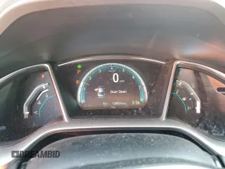 2018 Honda Civic EX with VIN 19XFC2F76JE027598, listed as a Copart auction lot 52301385 with 128,854 mi miles and Salvage Title. Bid and sale history available at DreamBid. Image 9.