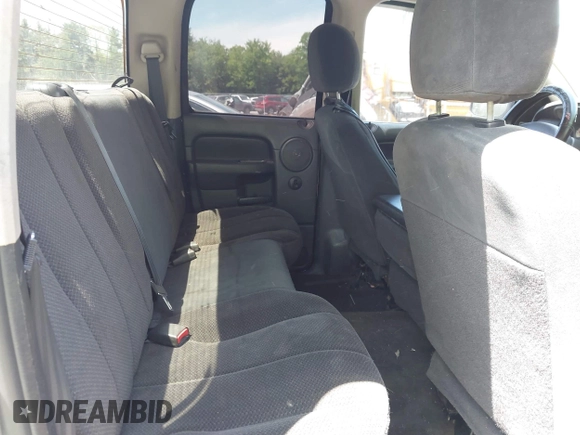 2003 Dodge 1500 SLT z VIN 1D7HU18N93J565767, wystawiony jako IAAI lot #42366236 z przebiegiem 182 372 mil mil oraz . Historia ofert i sprzedaży dostępna na DreamBid. Obrazek 8.