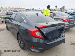 2020 Honda Civic Sedan EX-L with VIN 19XFC1F74LE209538, listed as a IAAI auction lot 42035988 with 51,893 mi miles. Bid and sale history available at carsss.com. Image 3.