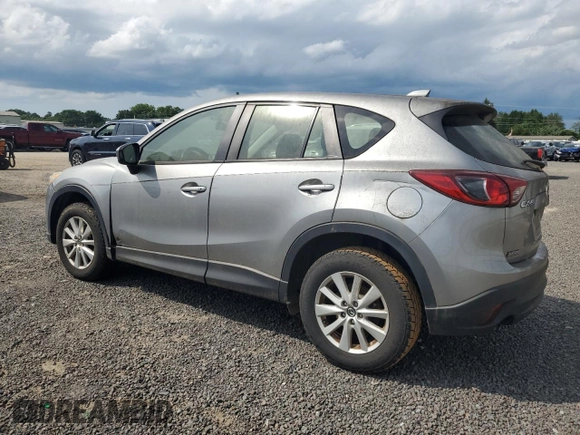 2014 Mazda CX-5 Sport with VIN JM3KE2BE7E0350965, listed as a Copart auction lot 60130195 with 196,072 mi miles and Clean title. Bid and sale history available at DreamBid. Image 2.
