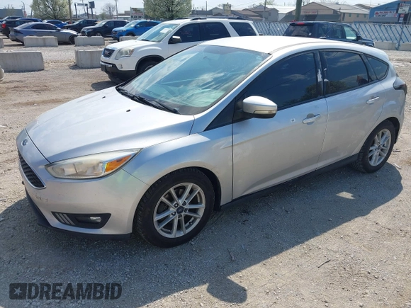 2015 Ford Focus SE with VIN 1FADP3K20FL288791, listed as a IAAI auction lot 42118958 with 164,248 mi miles. Bid and sale history available at carsss.com. Image 2.