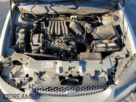 2003 Ford Taurus SE Standard with VIN 1FAFP53U13G188188, listed as a Copart auction lot 73574624 with 95,017 mi miles and Salvage Title. Bid and sale history available at DreamBid. Image 11.
