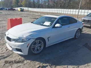 2014 BMW 4 Series 428i with VIN WBA3N3C53EF712057, listed as a IAAI auction lot 41868781 with 133,834 mi miles and . Bid and sale history available at DreamBid. Image 2.