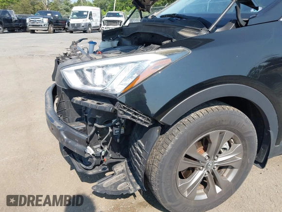 2014 Hyundai Santa Fe with VIN 5XYZUDLB9EG187420, listed as a IAAI auction lot 42369989 with 181,713 mi miles and . Bid and sale history available at DreamBid. Image 6.