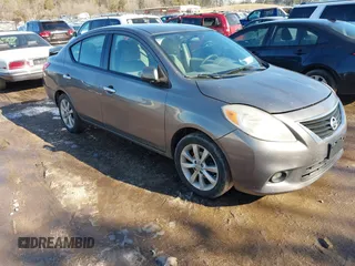 2014 Nissan Versa SV with VIN 3N1CN7AP9EL819833, listed as a IAAI auction lot 41351616 with 109,956 mi miles. Bid and sale history available at carsss.com. Image 1.