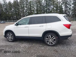 2017 Honda Pilot Elite with VIN 5FNYF6H06HB096156, listed as a IAAI auction lot 41771161 with 73,889 mi miles and . Bid and sale history available at DreamBid. Image 14.