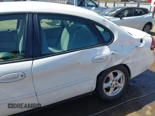 2002 Ford Taurus SE Standard with VIN 1FAFP53U42A173413, listed as a IAAI auction lot 42023834 with 159,744 mi miles and . Bid and sale history available at DreamBid. Image 6.