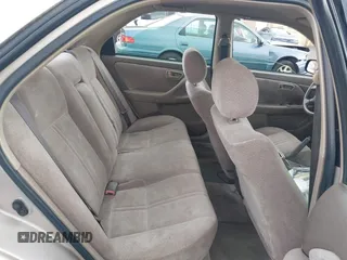1997 Toyota Camry LE z VIN 4T1BF22K8VU916373, wystawiony jako IAAI lot #41915751 z przebiegiem 259 818 mil mil oraz . Historia ofert i sprzedaży dostępna na DreamBid. Obrazek 8.