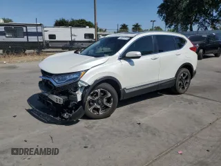 2018 Honda CR-V Touring z VIN 2HKRW2H99JH650065, wystawiony jako Copart lot #60372245 z przebiegiem Nie podano mil oraz Szkoda całkowita • Salvage title. Historia ofert i sprzedaży dostępna na DreamBid. Obrazek 1.
