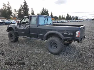 1997 Ford Ranger XLT with VIN 1FTCR15X8VPB38589, listed as a Copart auction lot 80037124 with 212,826 mi miles and Salvage Title. Bid and sale history available at DreamBid. Image 2.
