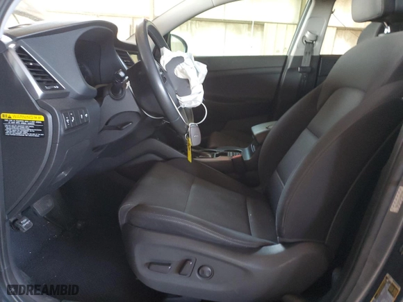 2018 Hyundai Tucson Value with VIN KM8J33A23JU823248, listed as a Copart auction lot 42967005 with 107,295 mi miles and Salvage Title. Bid and sale history available at carsss.com. Image 7.