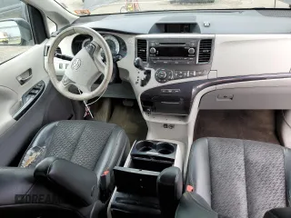 2014 Toyota Sienna SE with VIN 5TDXK3DC7ES425945, listed as a Copart auction lot 63067955 with 173,815 mi miles and Salvage title. Bid and sale history available at DreamBid. Image 8.