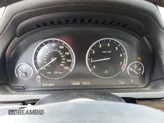 2012 BMW 7 Series 750i with VIN WBAKA8C50CDV99875, listed as a Copart auction lot 61663985 with 145,289 mi miles and Clean title. Bid and sale history available at DreamBid. Image 9.