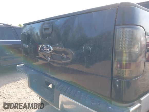 2005 Ford F-150 XLT with VIN 1FTPW145X5FA51759, listed as a IAAI auction lot 42077373 with 131,425 mi miles. Bid and sale history available at carsss.com. Image 14.