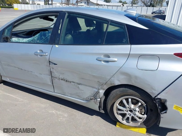 2021 Toyota Prius Prime LE with VIN JTDKAMFP4M3175051, listed as a IAAI auction lot 41856383 with 106,642 mi miles. Bid and sale history available at carsss.com. Image 6.
