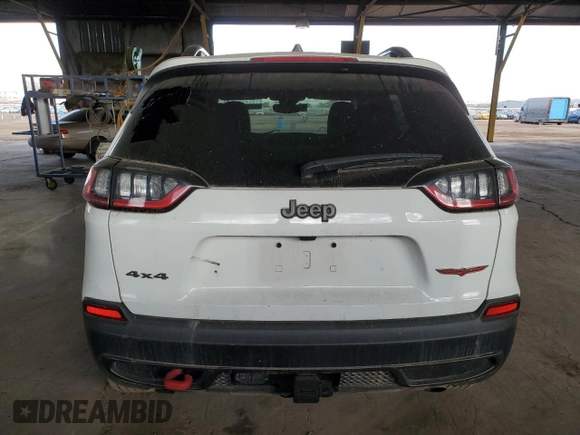 2022 Jeep Cherokee Trailhawk with VIN 1C4PJMBX6ND556259, listed as a Copart auction lot 44730605 with 55,328 mi miles and Non Repairable. Bid and sale history available at carsss.com. Image 6.